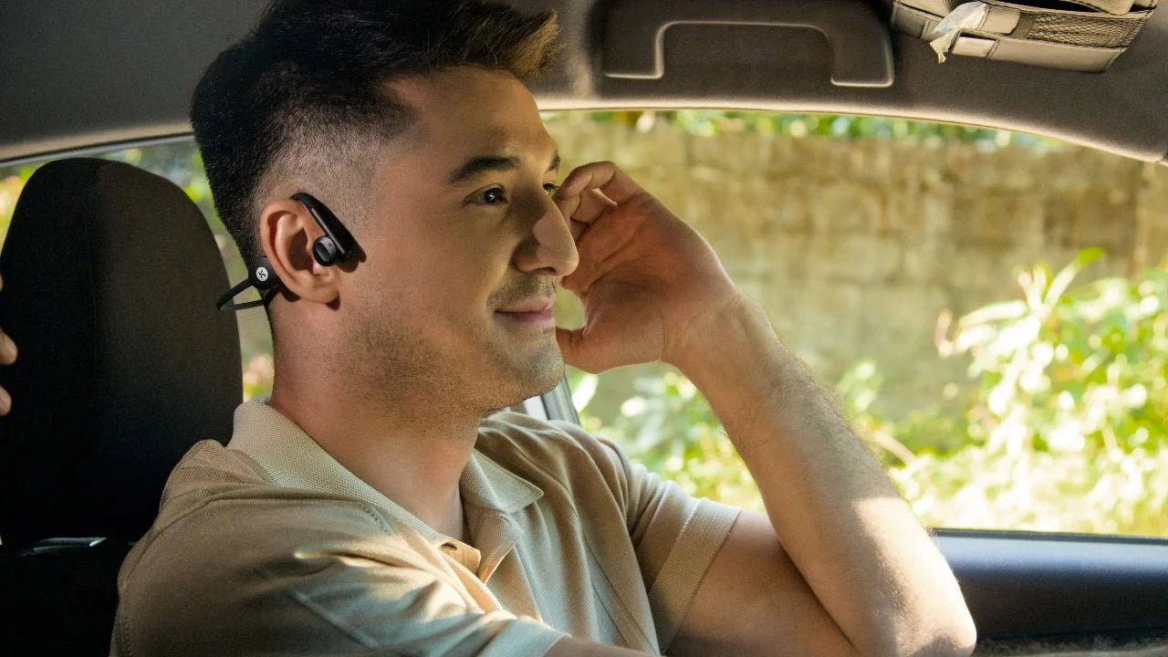 Kaibo Flex worn over the ear while driving