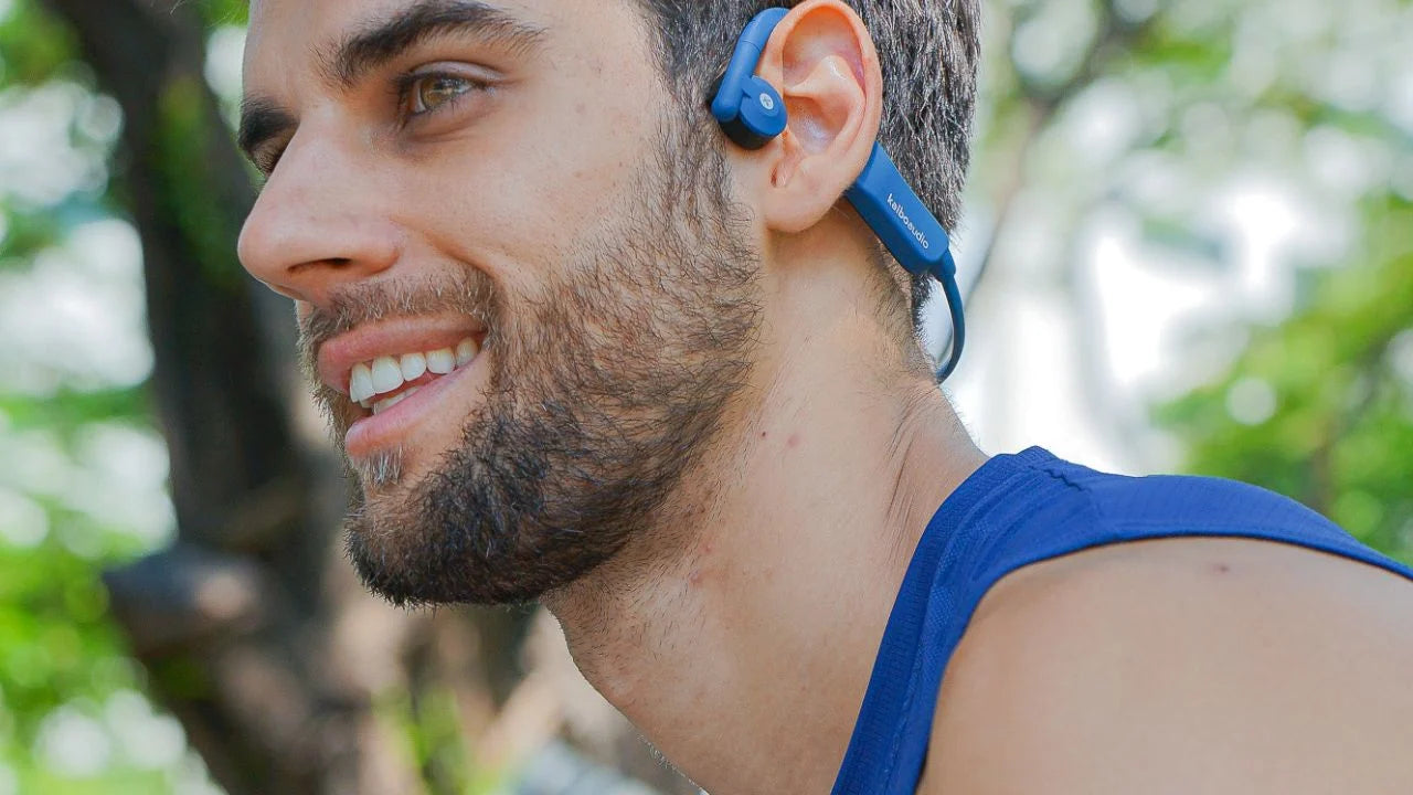 An open-ear Kaibo headset worn outdoors